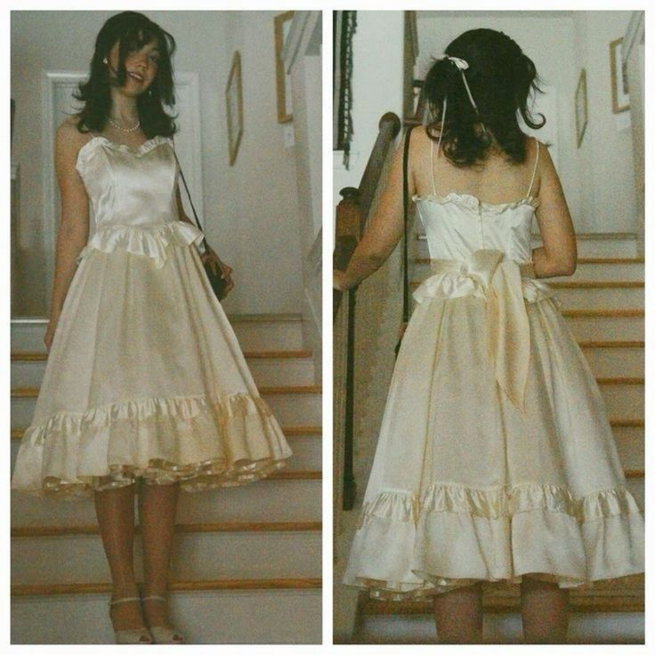 Jolie robe de soirée mi-longue ivoire à bretelles spaghetti et coupe trapèze MD7594