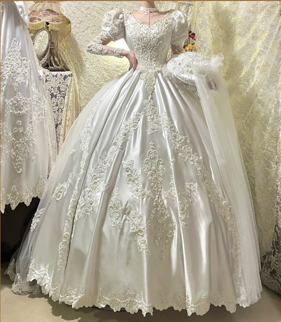 Superbe robe de mariée à manches longues et col en V D3089