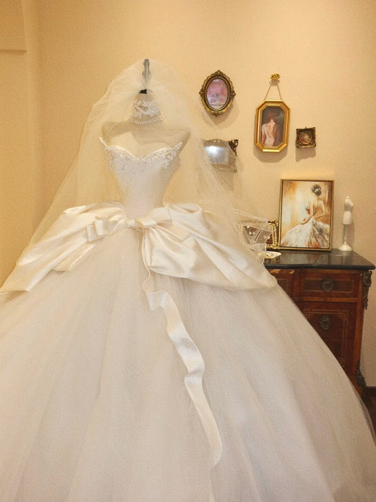 Robe de mariée en tulle plissé à col en cœur D3402