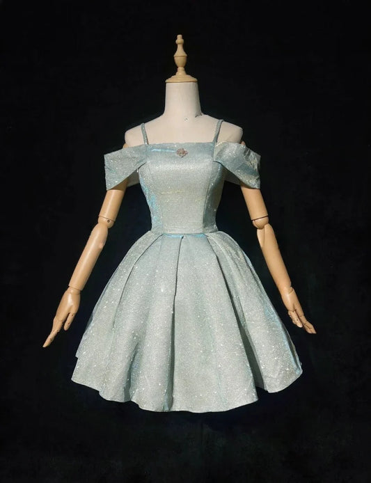 Robe de soirée trapèze en satin bleu clair à sequins scintillants et bretelles spaghetti D1576