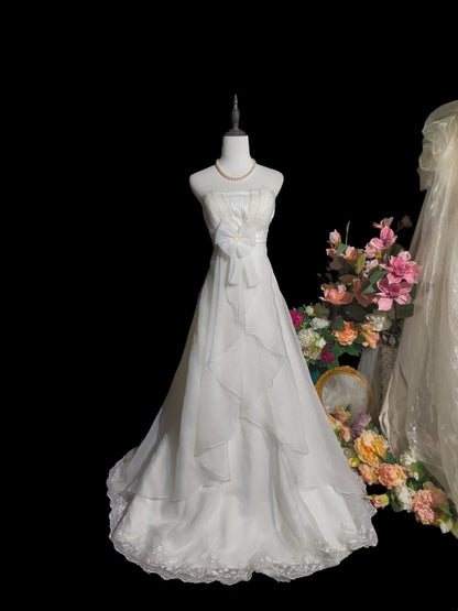 Jolie robe de mariée trapèze bustier à volants D3097