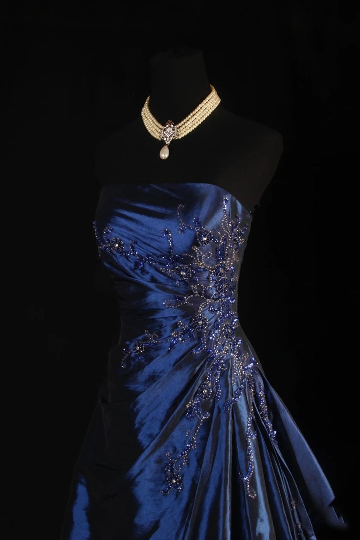 Navy blue satin prom dress detail view