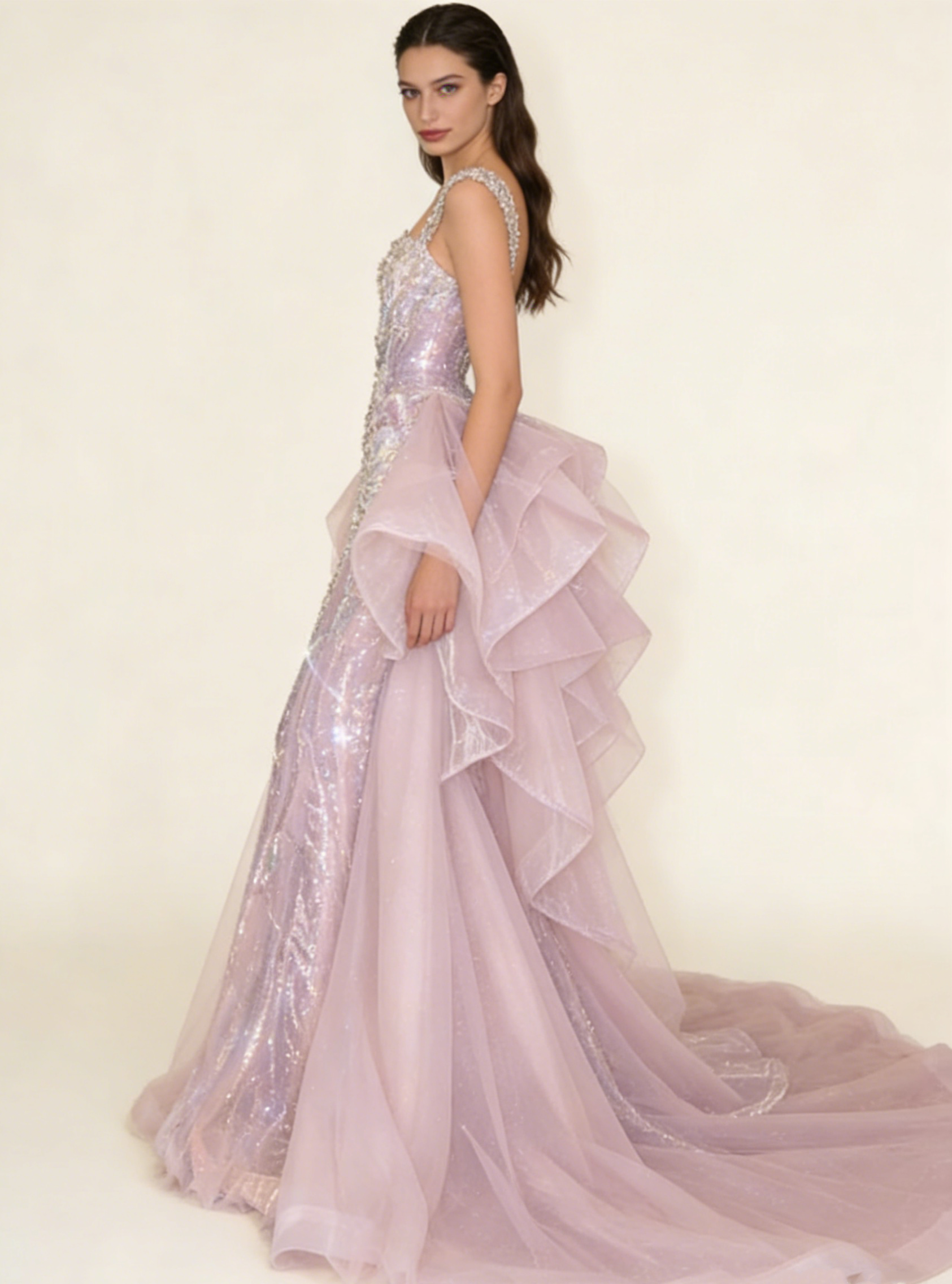 Pink mermaid evening gown model wearing side view