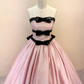 Pink satin evening gown detail view