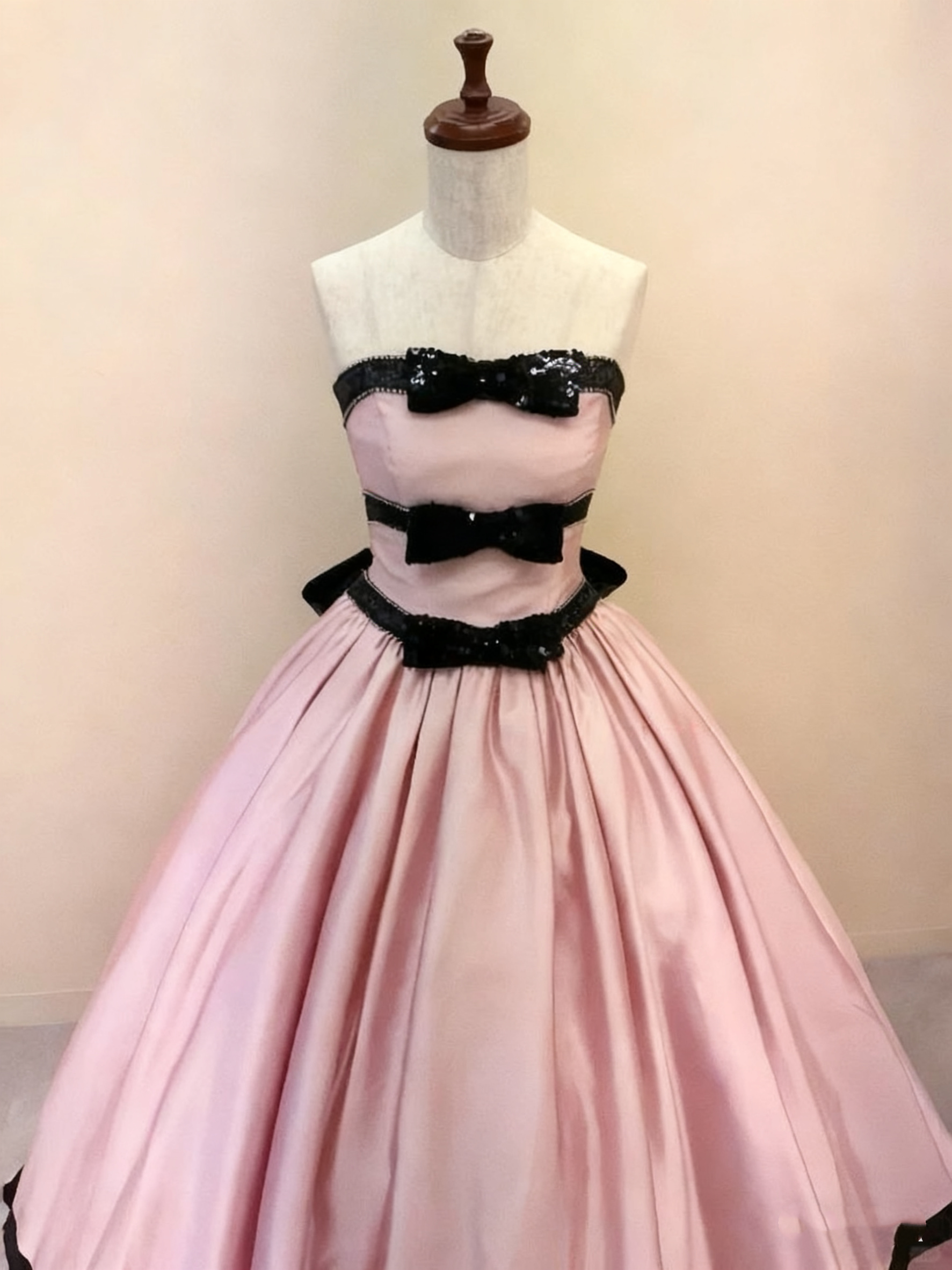 Pink satin evening gown detail view