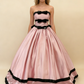 Pink satin ball gown model wearing front view
