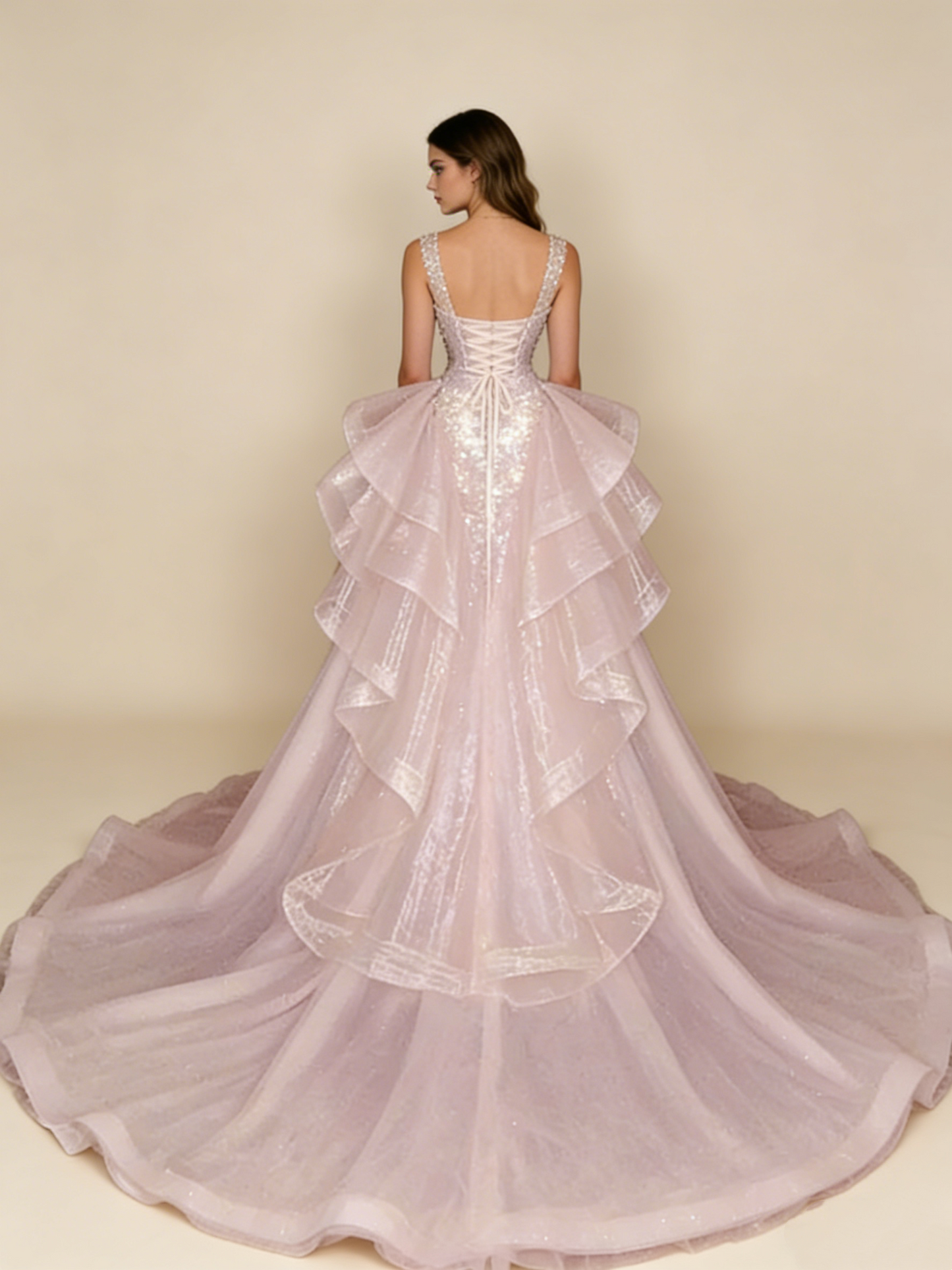 Pink evening gown model wearing back view