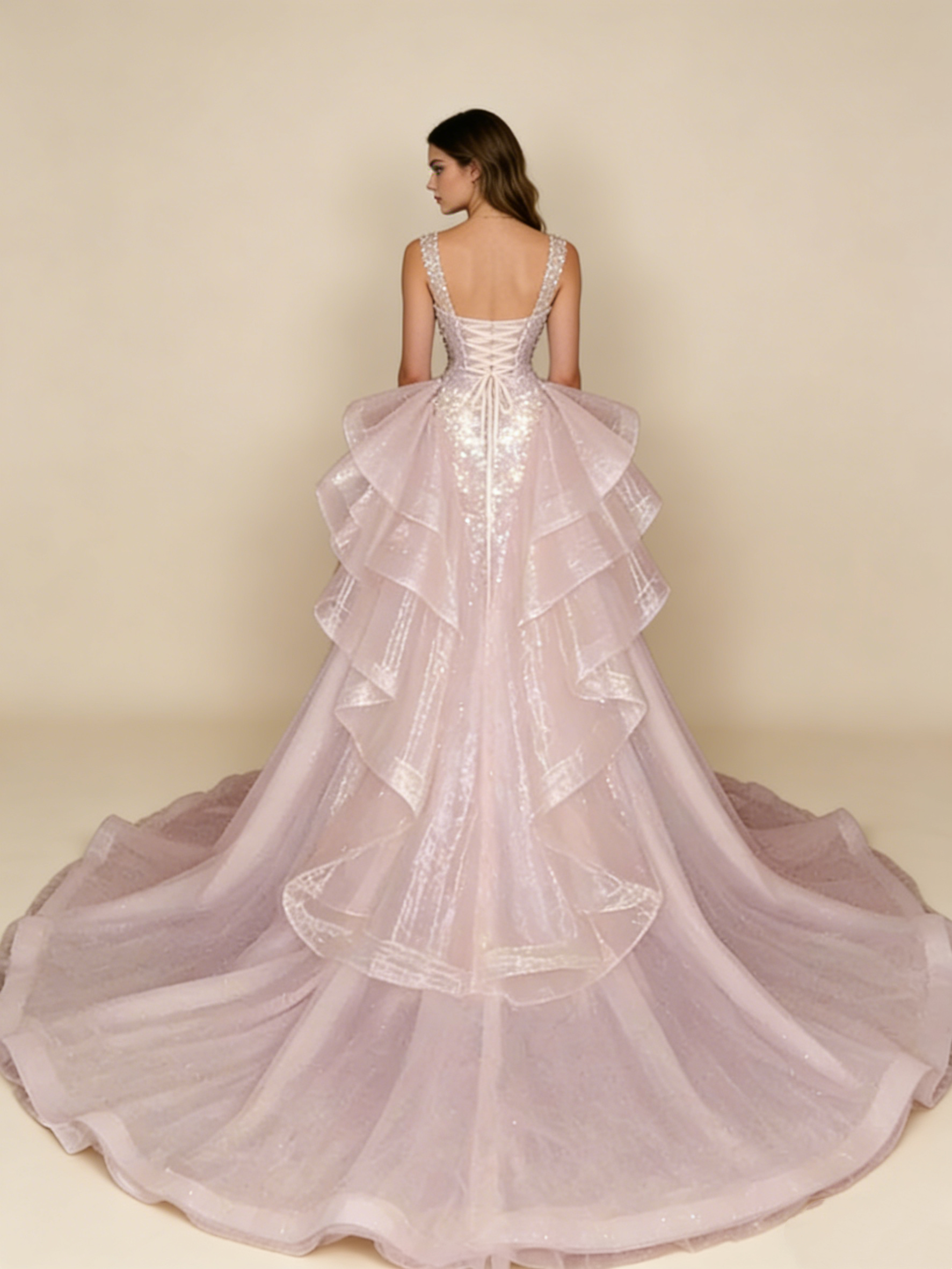 Pink evening gown model wearing back view